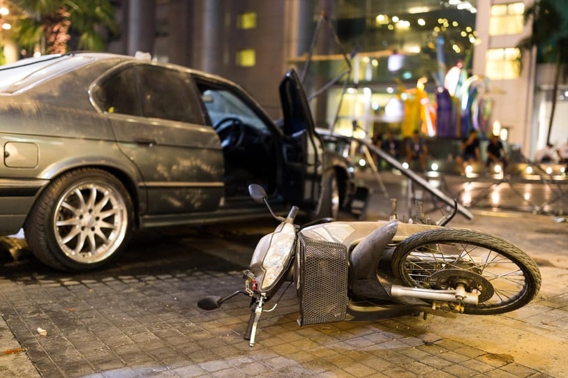 An older motorcycle that has been crashed after being hit by a car in Peachtree City, Georgia